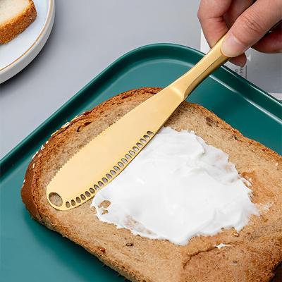 couteau-a-beurre-or