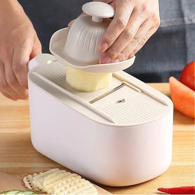 mandoline-pour-legumes-blanche-et-grise